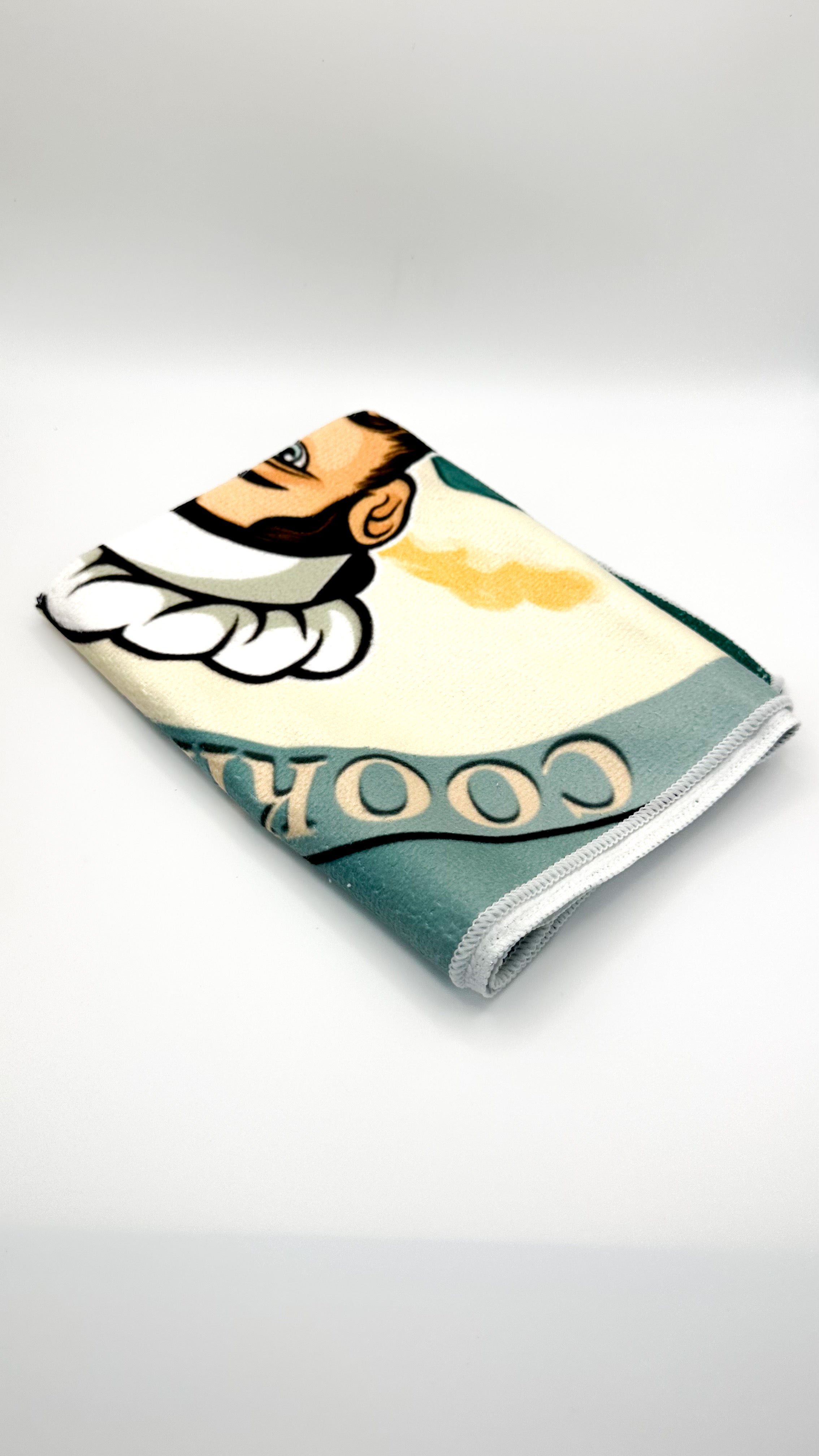 Cooking with Tucci Kitchen and dish towel